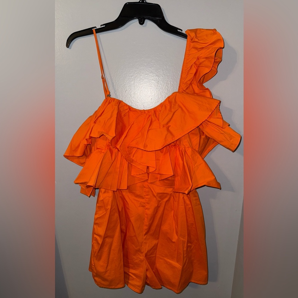 Orange romper from pants store size large